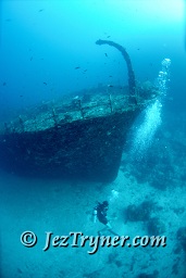 A diver at the stunning Kudu Giri wreck, Kudu giri, Maldives, Indian ocean, Asia